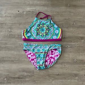 Barely worn bath suit. Justice girls XL. Reversible with  two designs.